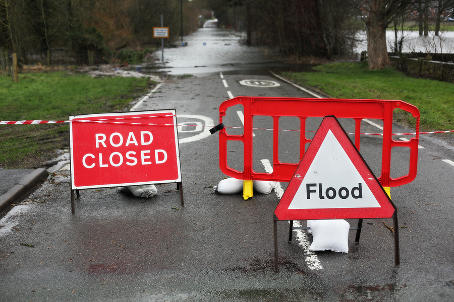 Road warning signs of flood
